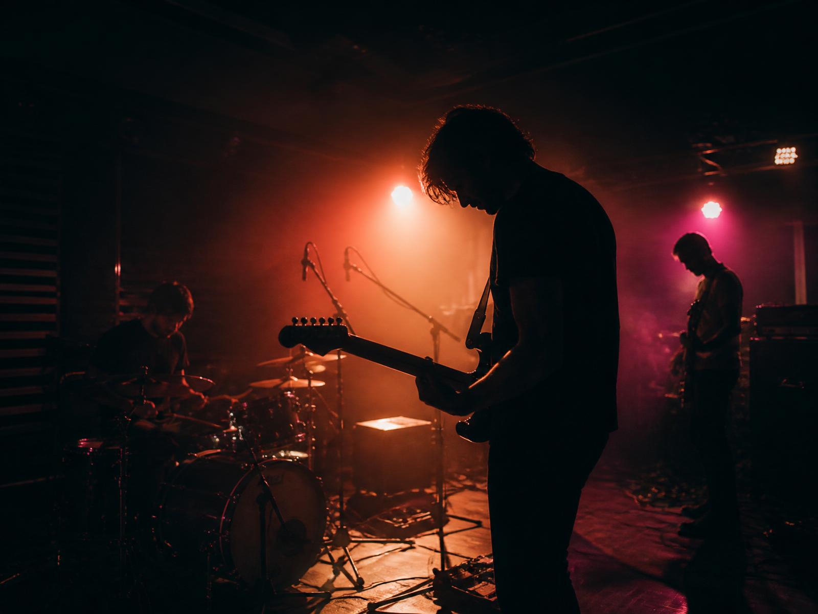 Live band under stage lights